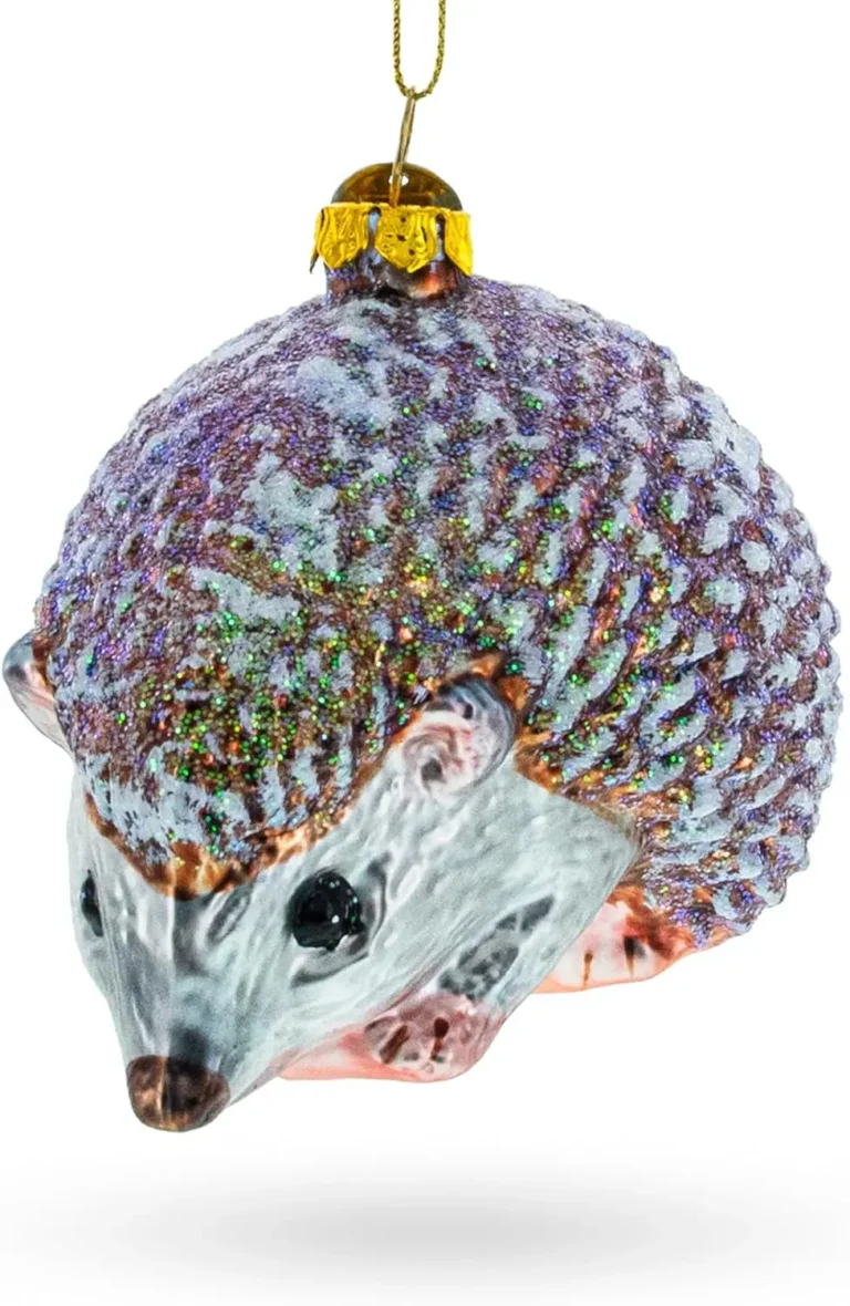 A hand-blown glossy and sparkly hedgehog Christmas tree ornament.