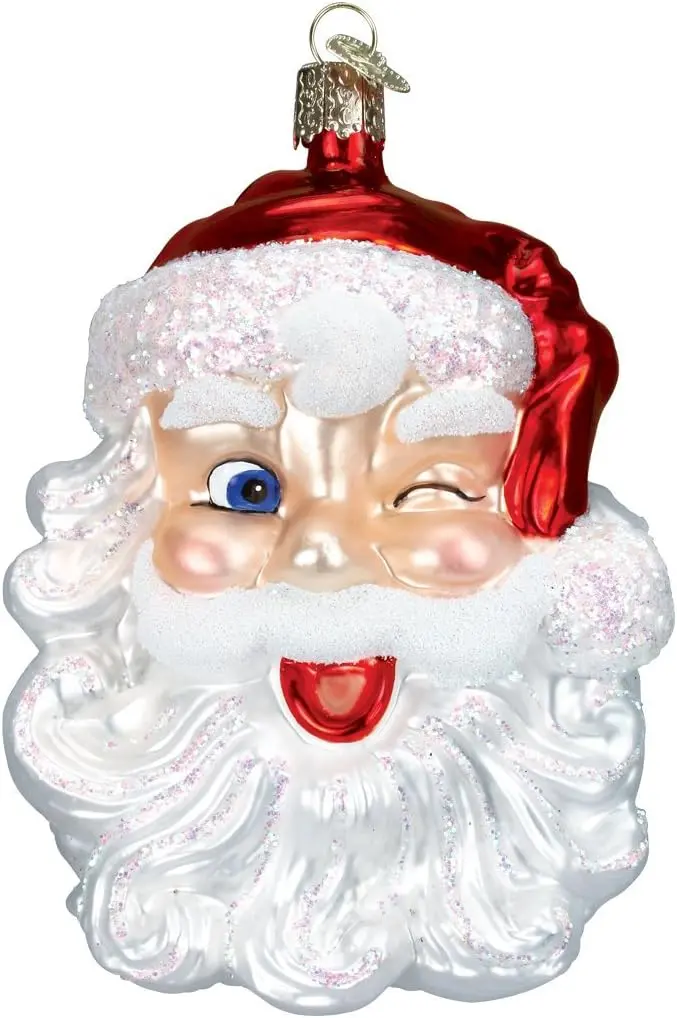 A vintage Christmas ornament of a jolly winking Santa; featuring a red hat with a shimmering trim and a sparkling glossy beard.
