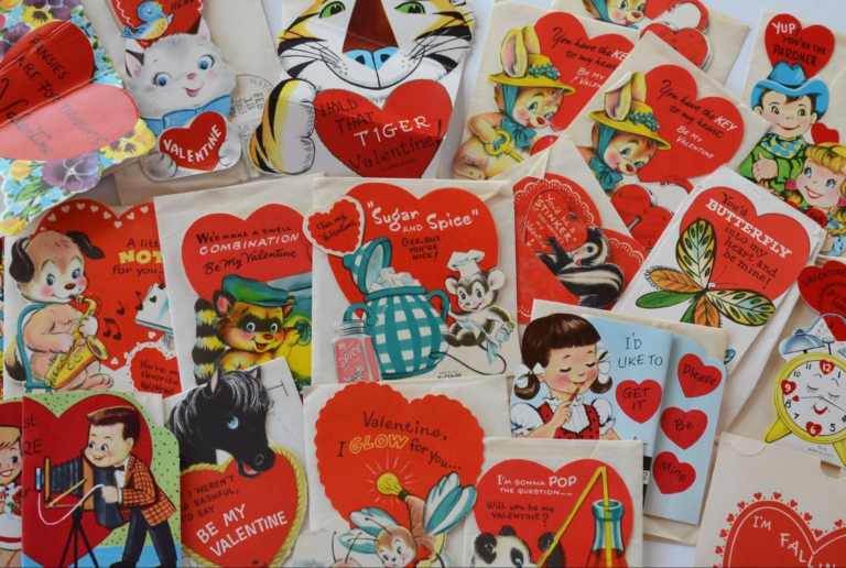 Vintage Valentine’s Day cards from the 1950s laid out on a flat surface.