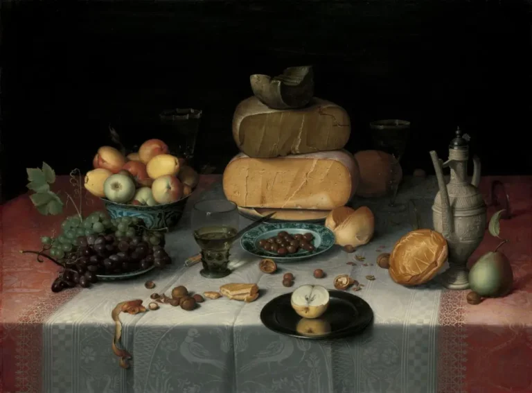 A renaissance still life featuring blocks of cheese, a plate of olives, grapes, a bowl of apples and quince, walnut shells, and other pieces of food and kitchen accessories on a fancy tablecloth.