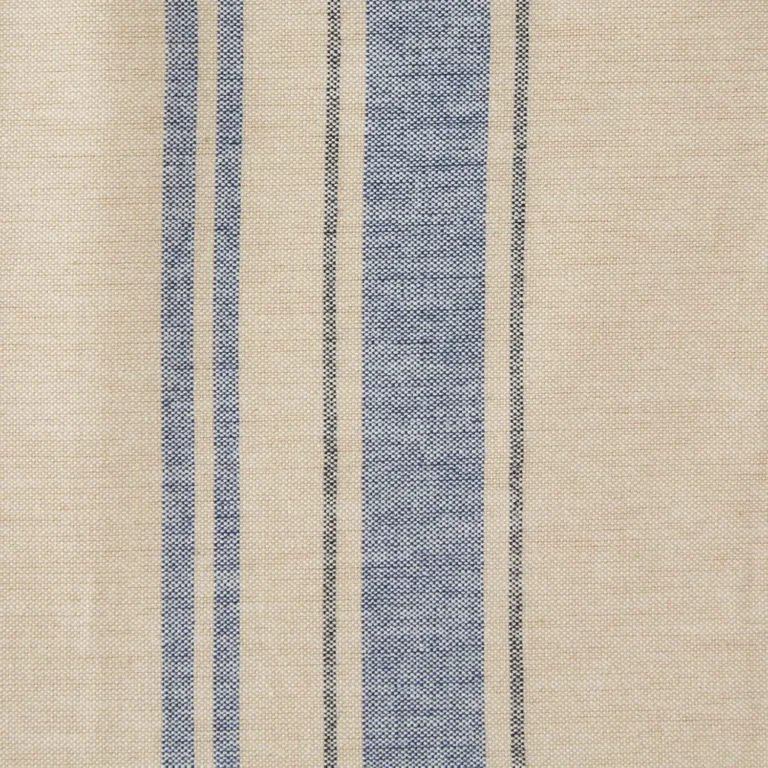 A square shaped photo of a white and blue linen design.