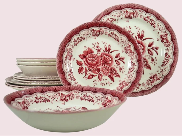 Vintage red and white English dinnerware featuring floral designs.