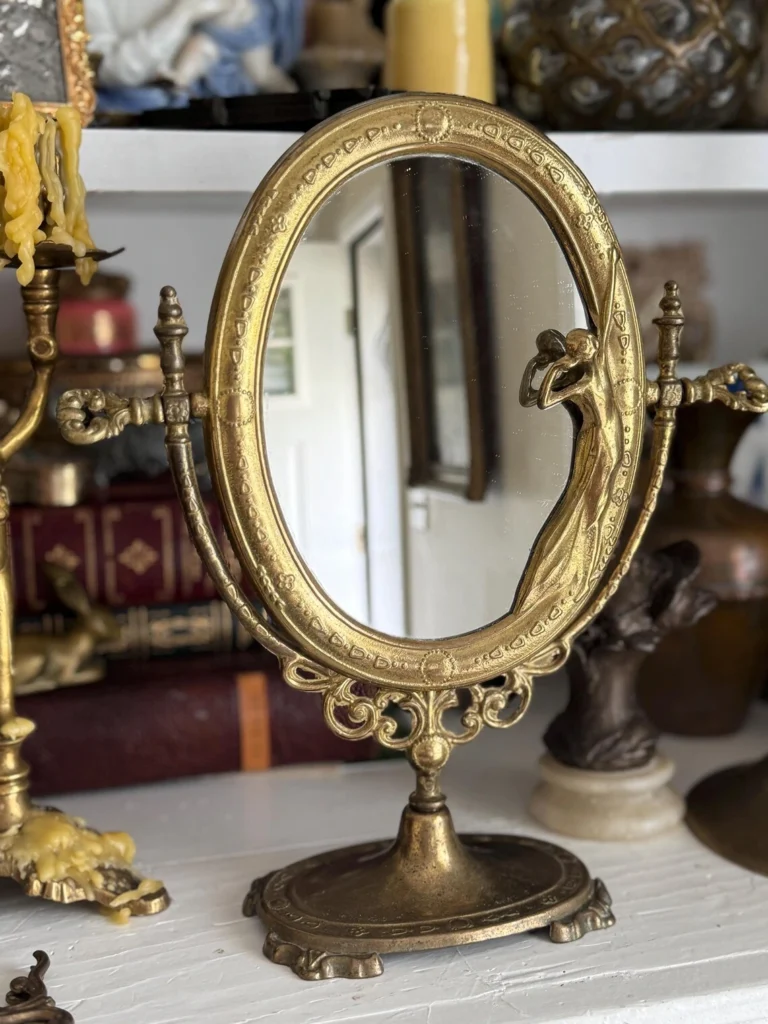 Stack of vintage green hardcover books for rustic home decor and antique library styling.